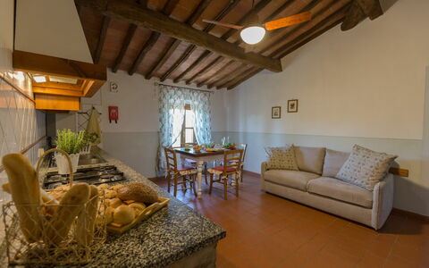 Feriebolig Montelopio 7: Frokostlokale, Køkken, Stue