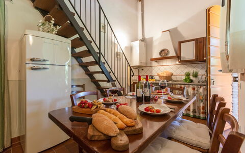 Feriebolig Montelopio 5: Frokostlokale, Køkken, Stue