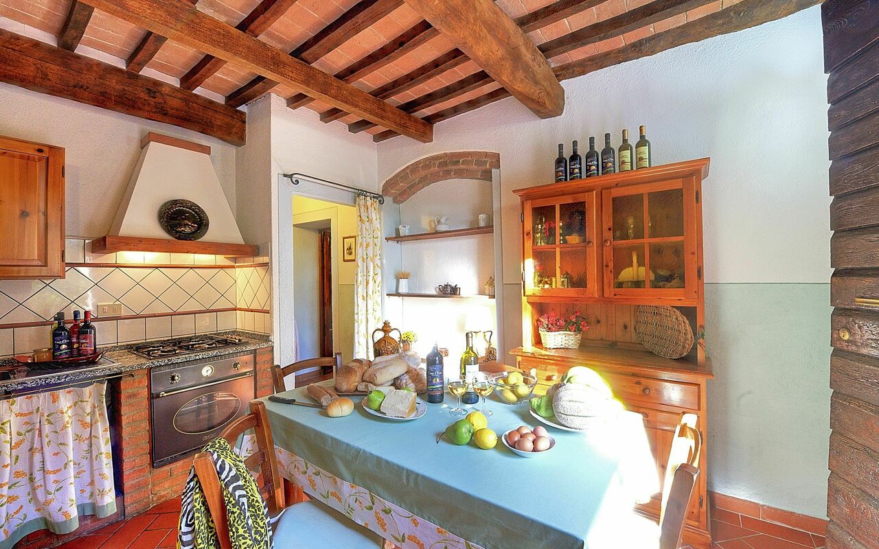 Feriebolig Montelopio 2: Frokostlokale, Køkken, Stue