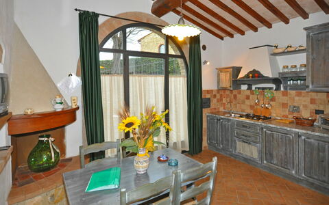 Feriebolig Olivo: Frokostlokale, Køkken, Stue