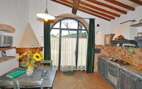 Feriebolig Olivo: Frokostlokale, Køkken, Stue