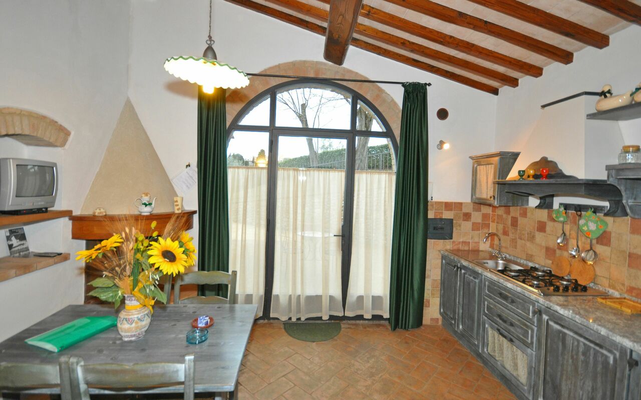 Feriebolig Olivo: Frokostlokale, Køkken, Stue