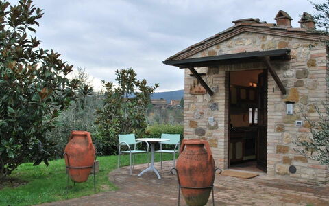 Feriebolig Il Cottage: Have, Udendørs