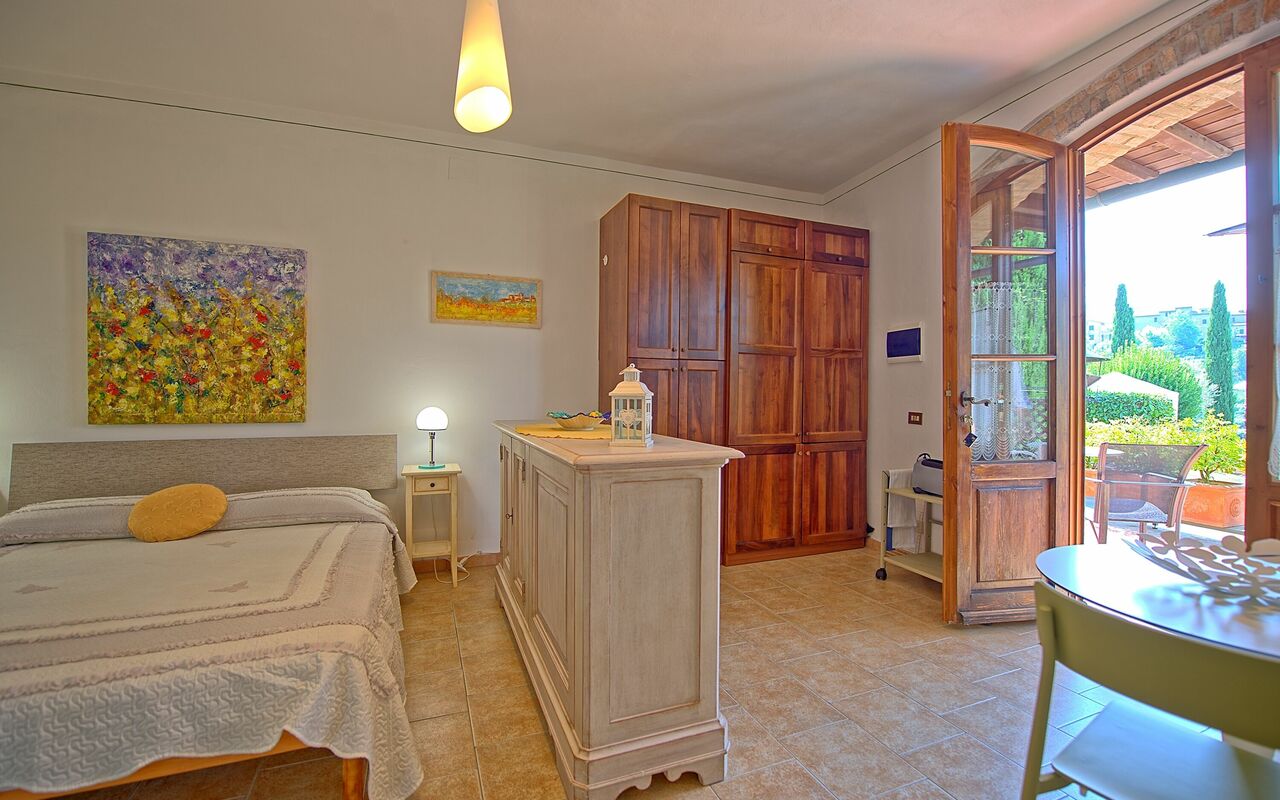 Feriebolig Ovile: Frokostlokale, Køkken, soveværelse, Stue