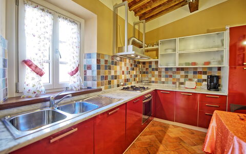 Feriebolig Flavia 1: Frokostlokale, Køkken