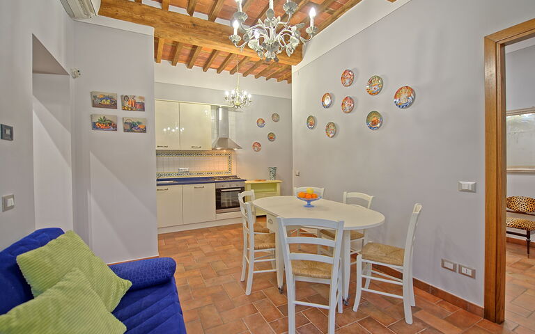 Feriebolig Flavia 4: Frokostlokale, Køkken, Stue