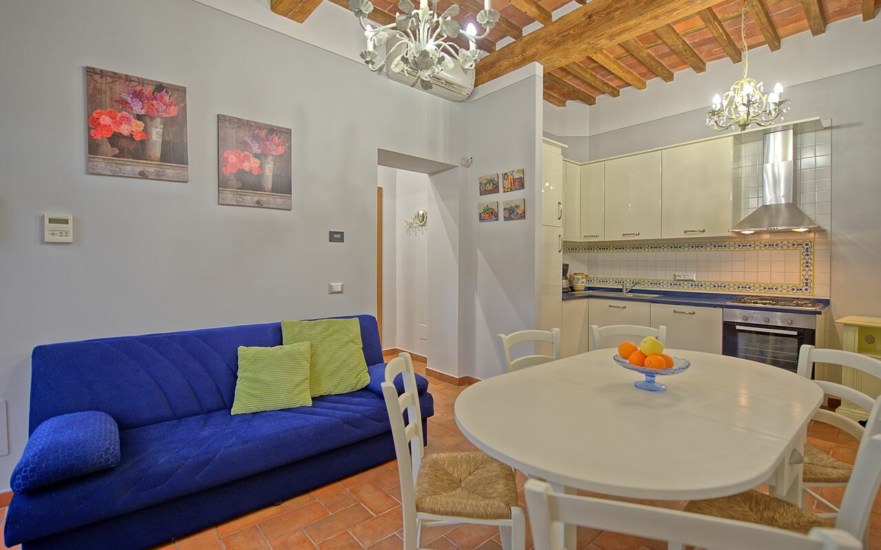 Feriebolig Flavia 4: Frokostlokale, Køkken, Stue