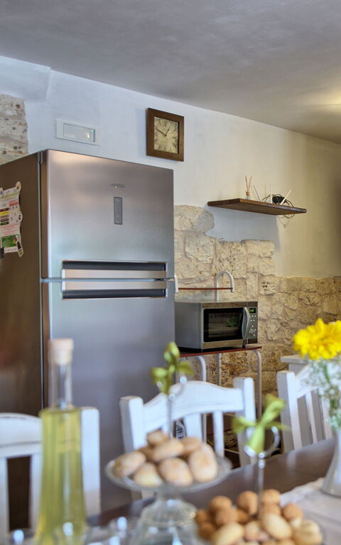 Trullo Santo Stefano: Frokostlokale, Køkken, Stue