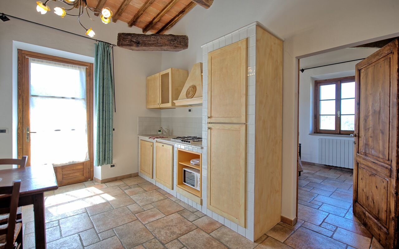 Feriebolig Mulignone 14: Frokostlokale, Køkken, Stue