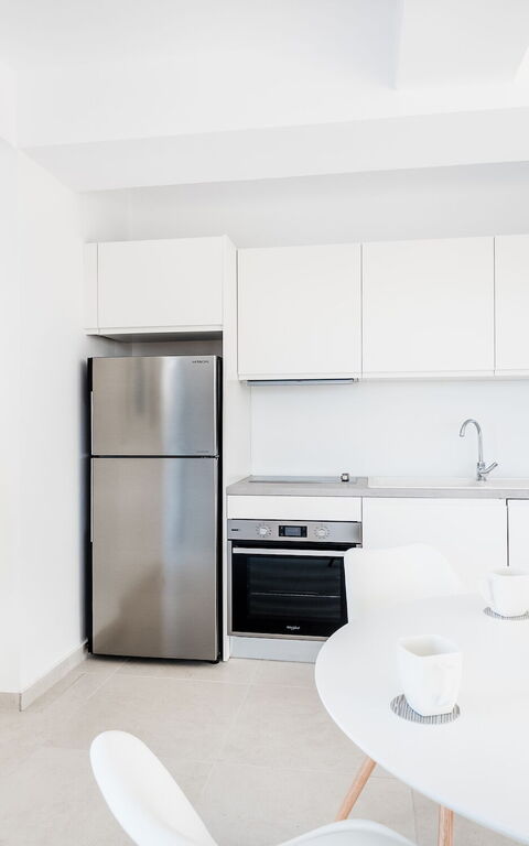 Villa Athena: Frokostlokale, Køkken, Stue