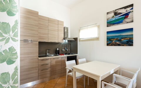 Feriebolig Kalika: Frokostlokale, Køkken, Stue