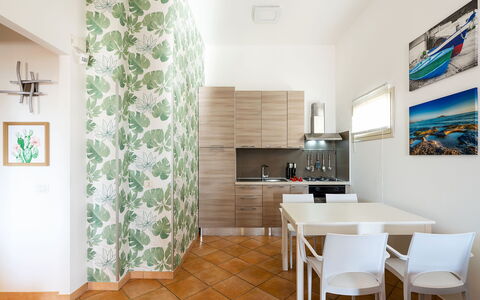 Feriebolig Kalika: Frokostlokale, Køkken, Stue