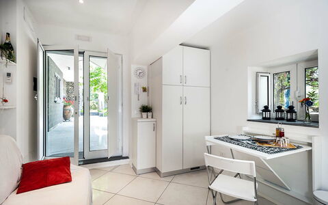 Feriebolig Conchiglia: Frokostlokale, Køkken, Stue