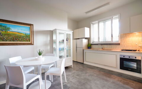 Feriebolig Corallo: Frokostlokale, Køkken