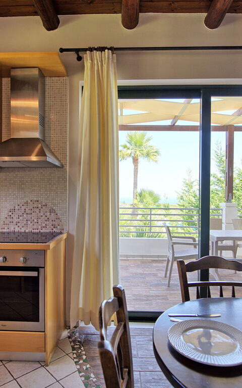 Villa Myrtia: Frokostlokale, Køkken, Stue