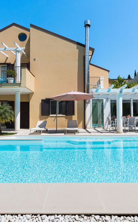 Villa Giutitta: Have, pool, Udvendige