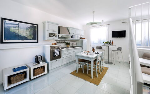 Feriebolig Delfino: Frokostlokale, Køkken, Stue