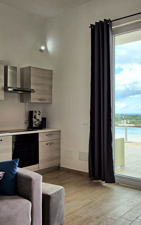 Villa Infinito: Køkken, Stue